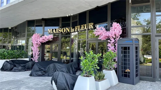 a view of a chairs and table in patio
