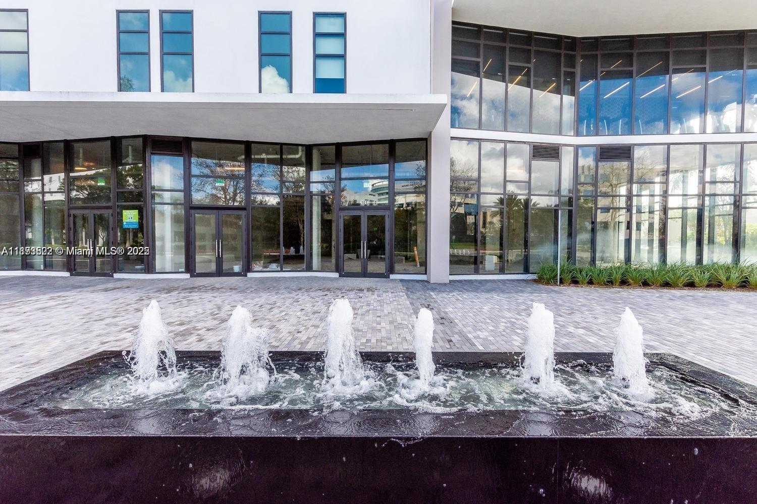 2960 Northeast 207th Street, Unit 1106 Aventura, FL 33180 - Photo 19 of 31 a view of a building with a porch