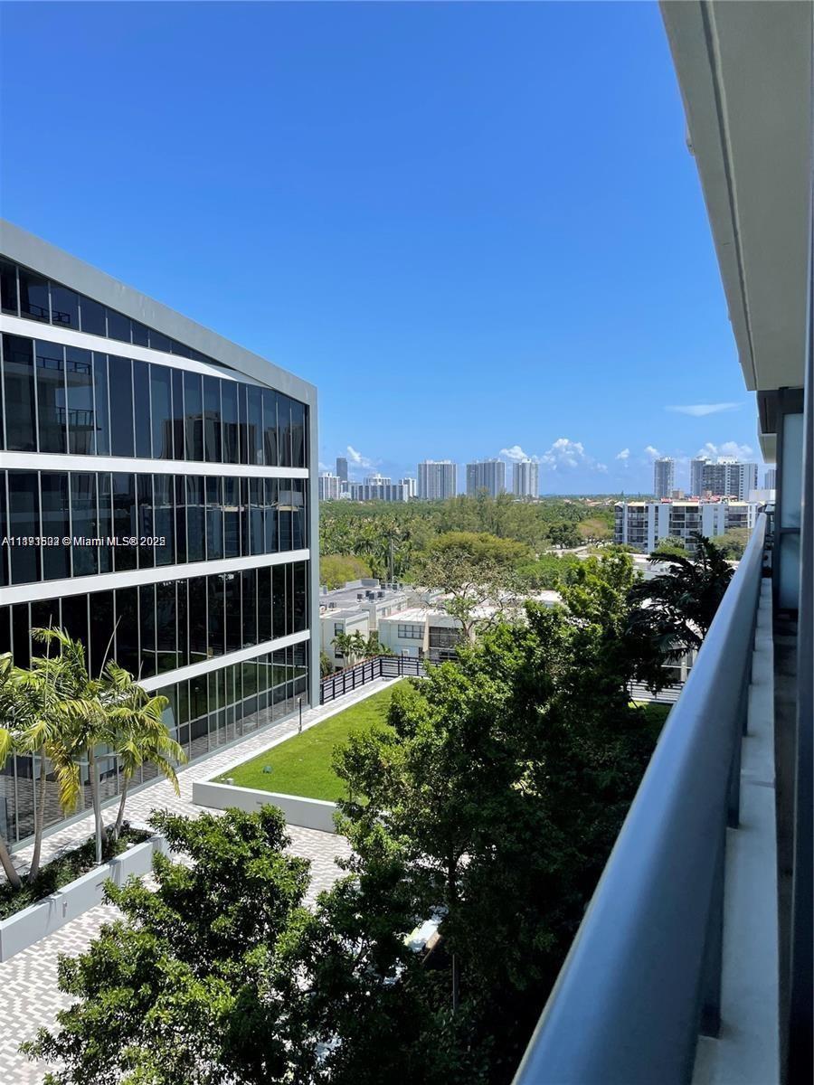 2960 Northeast 207th Street, Unit 1106 Aventura, FL 33180 - Photo 29 of 31 a view of balcony with outdoor space