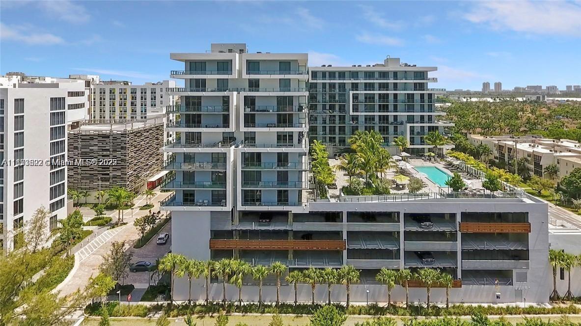 2960 Northeast 207th Street, Unit 1106 Aventura, FL 33180 - Photo 4 of 31 a front view of a building