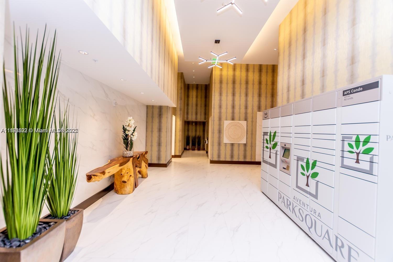 2960 Northeast 207th Street, Unit 1106 Aventura, FL 33180 - Photo 8 of 31 a view of a hallway with painted walls