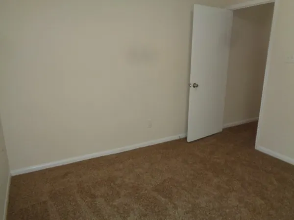 a view of a backyard of the house