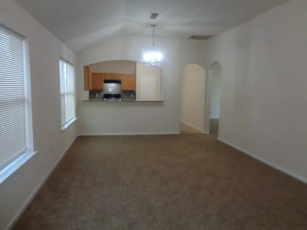 a view of a livingroom with furniture