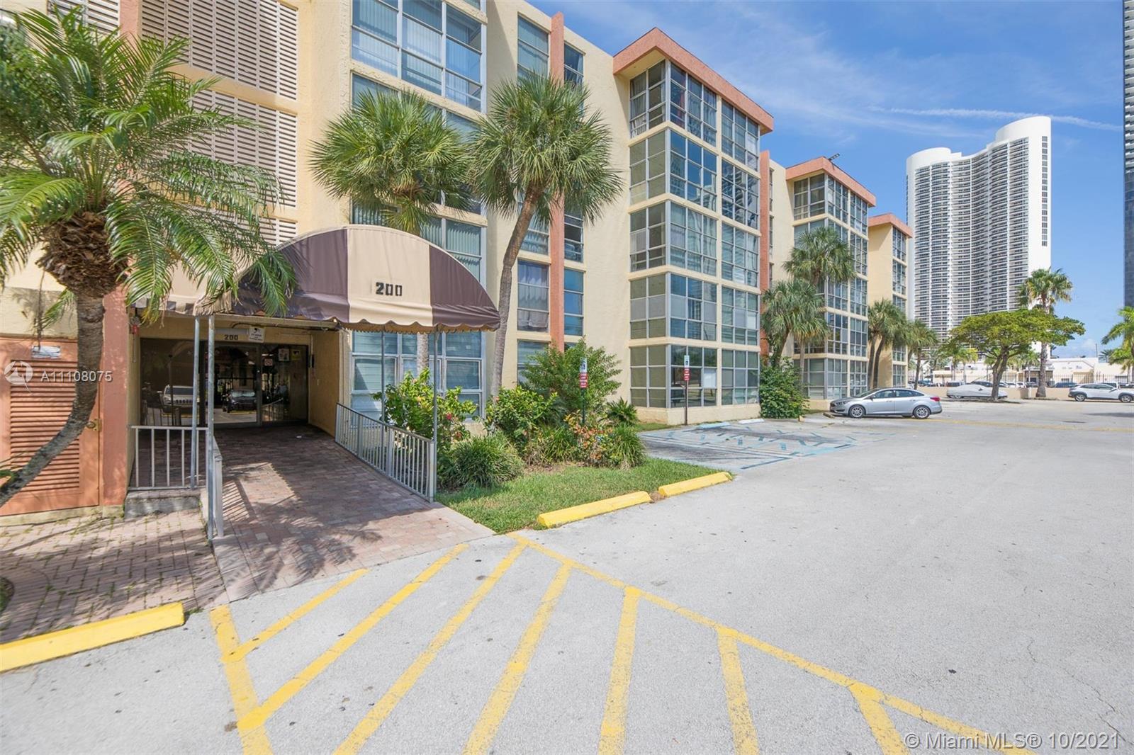 200 172nd Street, Unit 317 Sunny Isles Beach, FL 33160 - Photo 26 of 27 a view of a building with a street