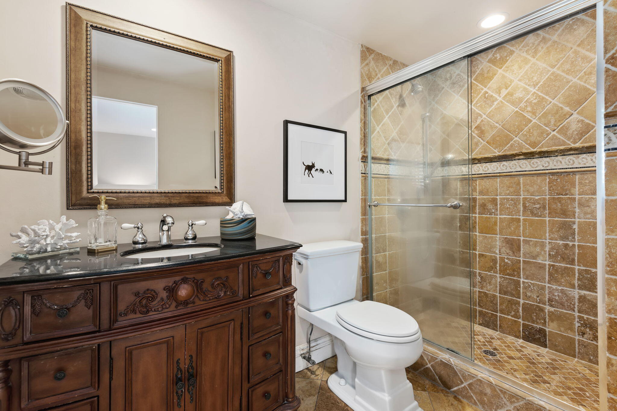 42 Northridge Road Santa Barbara, CA 93105 - Photo 11 of 22 a bathroom with a toilet a sink and mirror