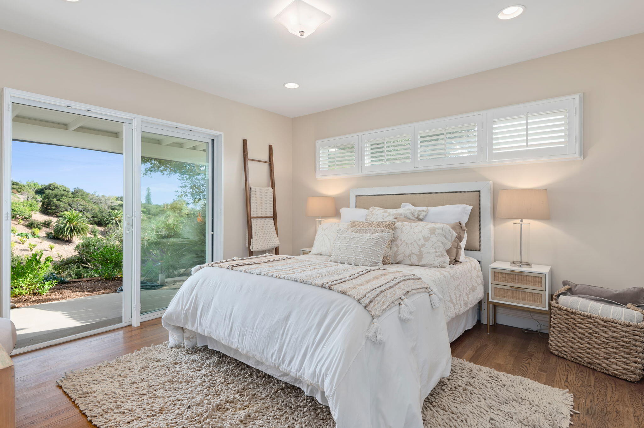 42 Northridge Road Santa Barbara, CA 93105 - Photo 14 of 22 a bedroom with a bed and wooden floor
