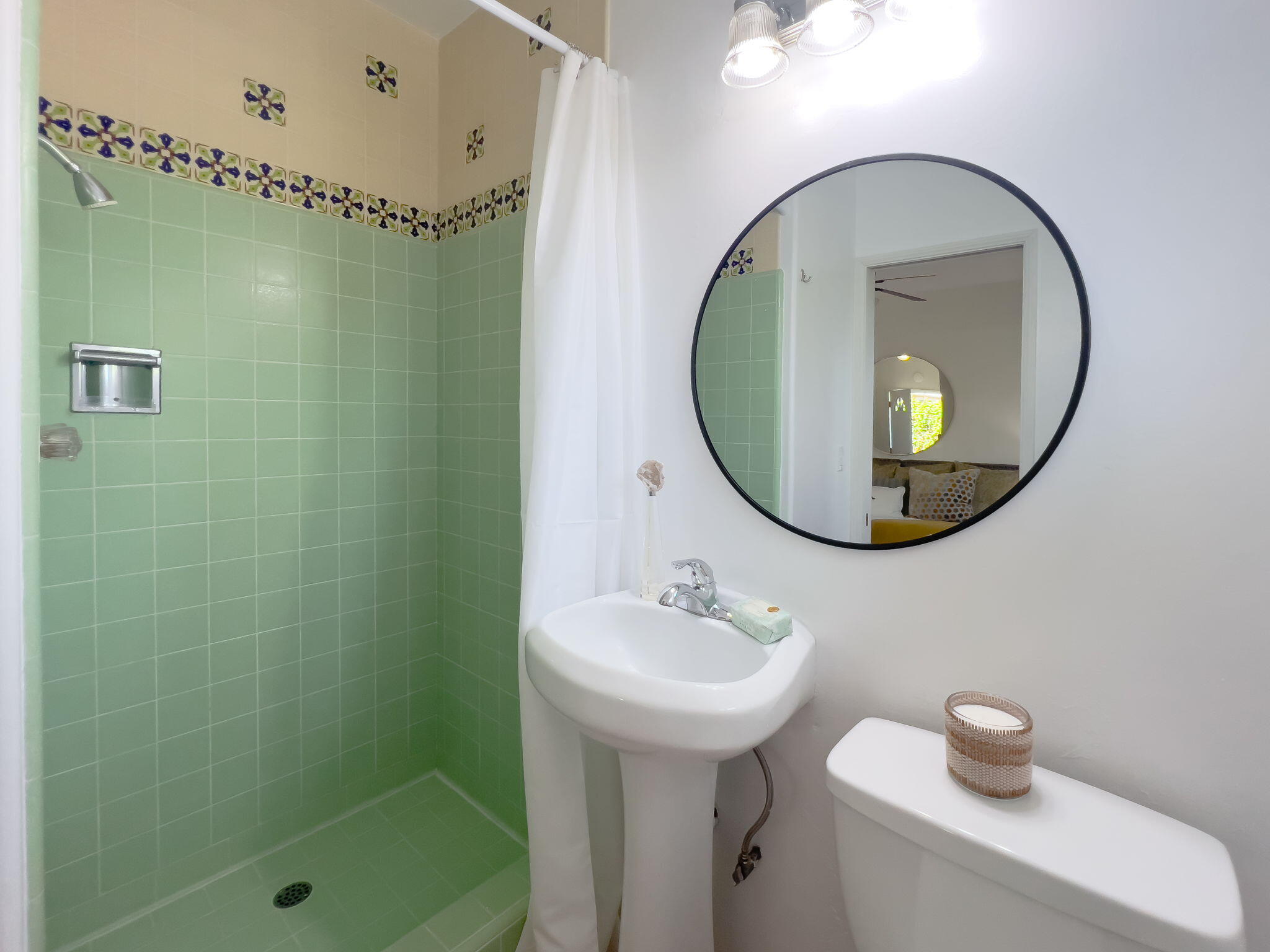 42 Northridge Road Santa Barbara, CA 93105 - Photo 18 of 22 a bathroom with a sink toilet and a mirror