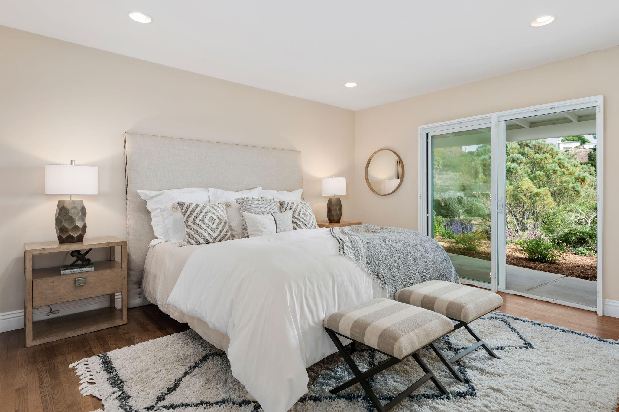 42 Northridge Road Santa Barbara, CA 93105 - Photo 10 of 22 a bedroom with a bed and wooden floor
