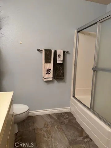 a bathroom with a toilet