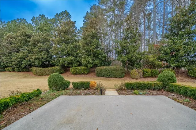 a view of a street with a park