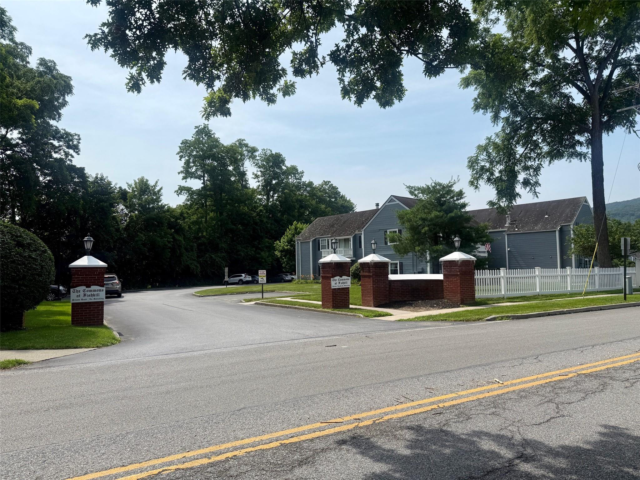 600 Commons Way, Unit A Fishkill, NY 12524 - Photo 1 of 1 View of asphalt road with sidewalks