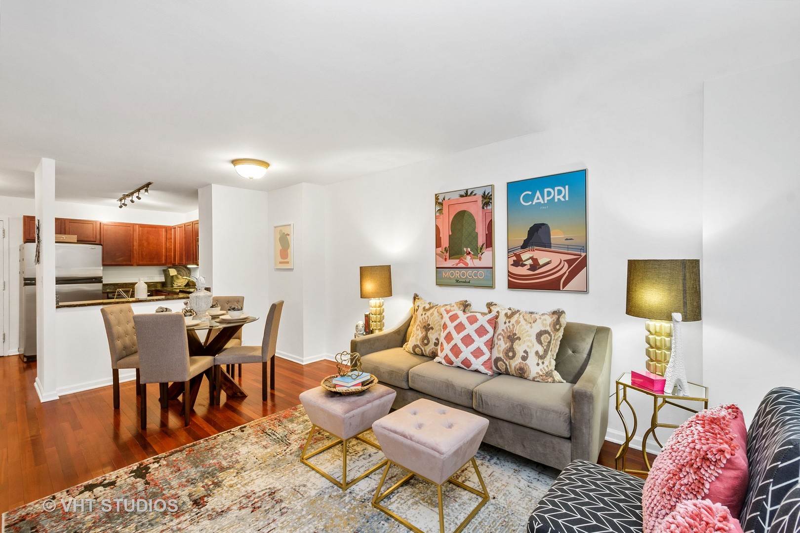 222 East Pearson Street, Unit 707 Chicago, IL 60611 - Photo 3 of 13 a living room with furniture a rug and a flat screen tv