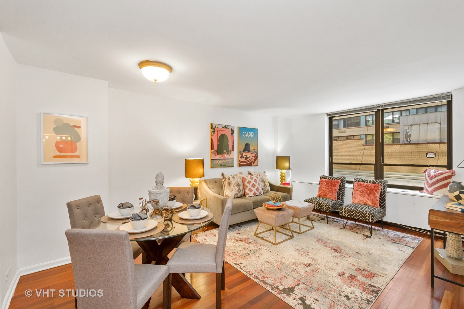 222 East Pearson Street, Unit 707 Chicago, IL 60611 - Photo 4 of 13 a living room with furniture and a large window