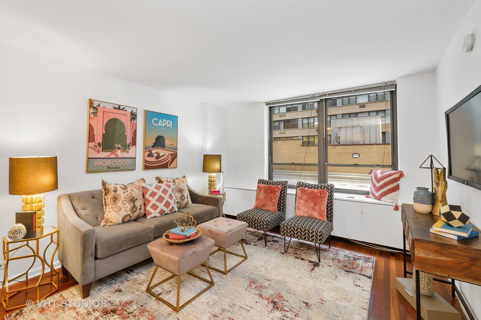 222 East Pearson Street, Unit 707 Chicago, IL 60611 - Photo 5 of 13 a living room with furniture and a flat screen tv