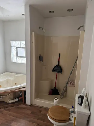 a bathroom with a sink a toilet and a bathtub