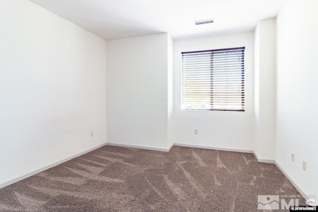 9635 Caitlin Court Reno, NV 89521 - Photo 17 of 23 an empty room with a window