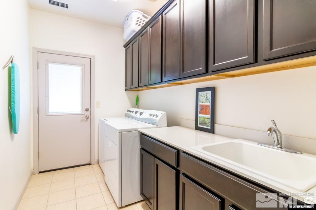 9635 Caitlin Court Reno, NV 89521 - Photo 20 of 23 a utility room with dryer and washer