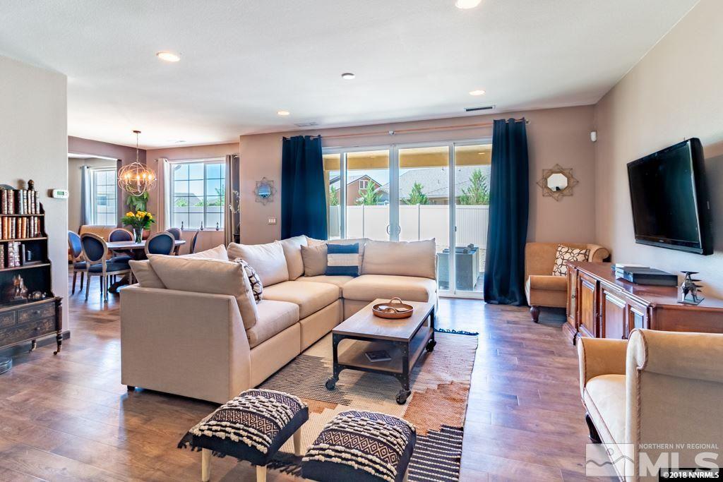 9635 Caitlin Court Reno, NV 89521 - Photo 2 of 23 a living room with furniture and a flat screen tv