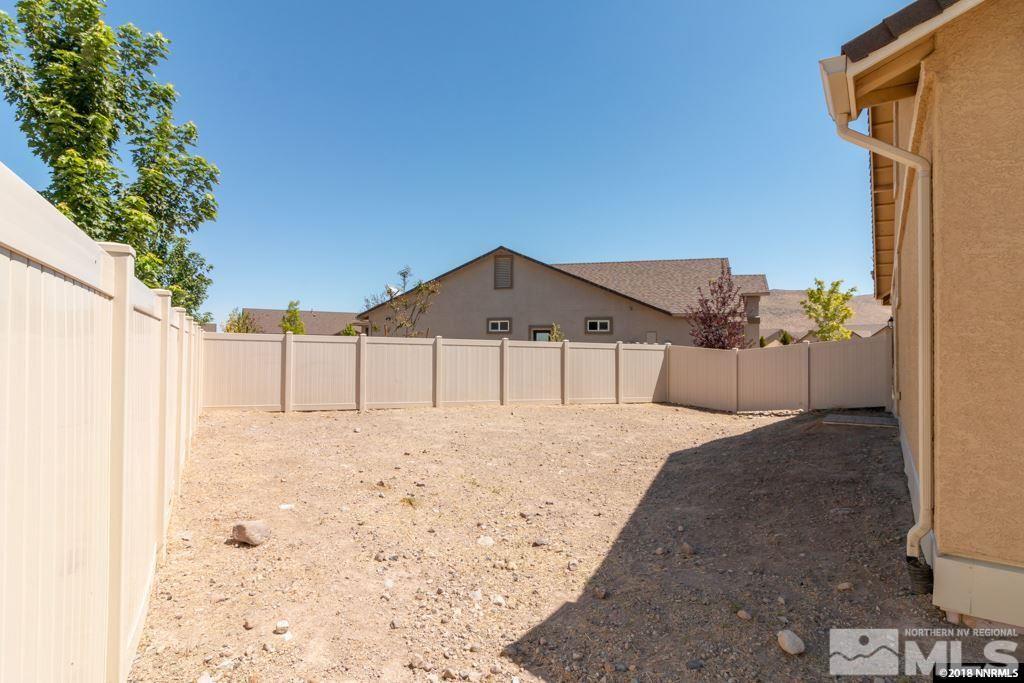 9635 Caitlin Court Reno, NV 89521 - Photo 23 of 23 a view of a backyard of house