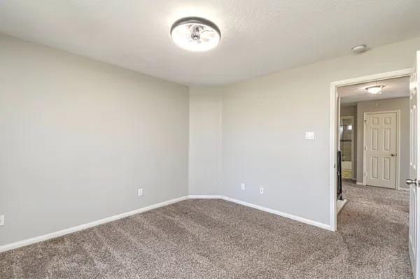a view of a room with a fan
