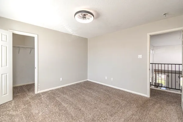 a view of a livingroom with a staircase