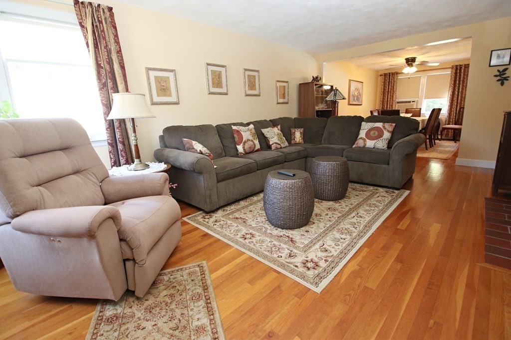 34 Adams Avenue Saugus, MA 01906 - Photo 11 of 42 a living room with furniture and a couch