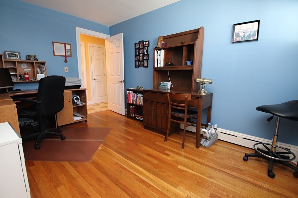 34 Adams Avenue Saugus, MA 01906 - Photo 13 of 42 a view of a workspace with furniture and a window