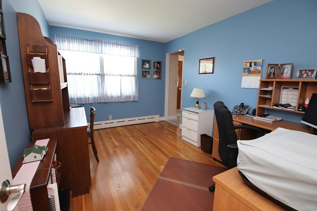 34 Adams Avenue Saugus, MA 01906 - Photo 14 of 42 a workspace with furniture hardwood and a window
