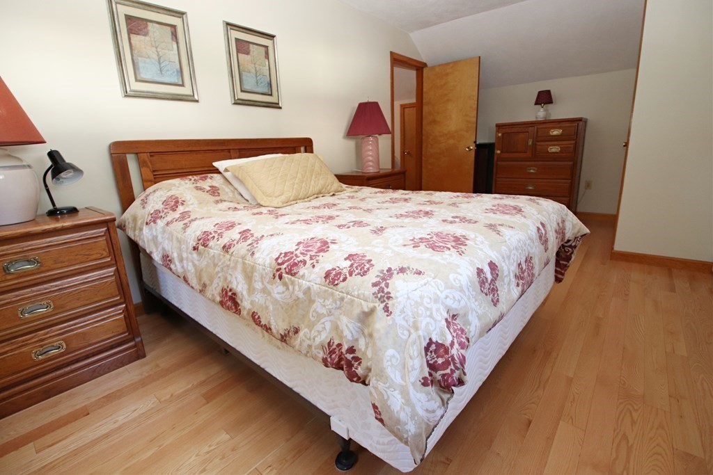 34 Adams Avenue Saugus, MA 01906 - Photo 24 of 42 a bedroom with a bed and a dresser