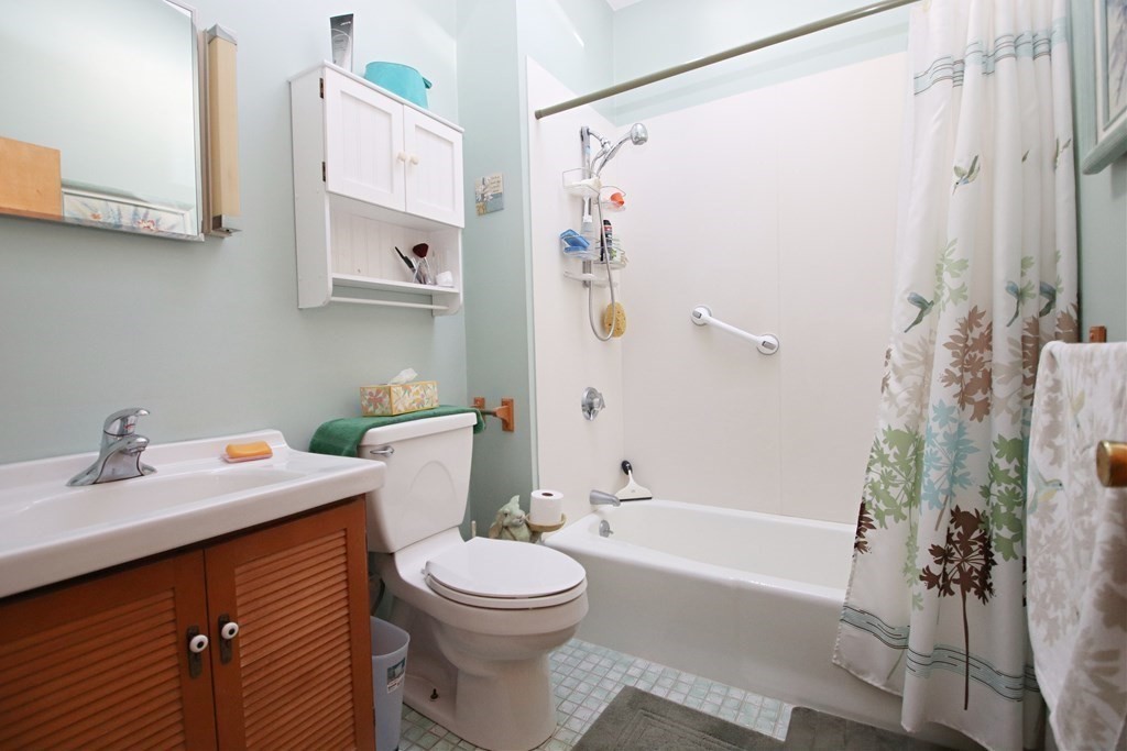 34 Adams Avenue Saugus, MA 01906 - Photo 27 of 42 a bathroom with a sink a toilet and shower
