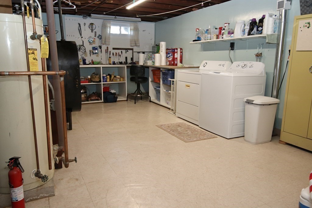 34 Adams Avenue Saugus, MA 01906 - Photo 33 of 42 a view of a storage & utility room with washer and dryer