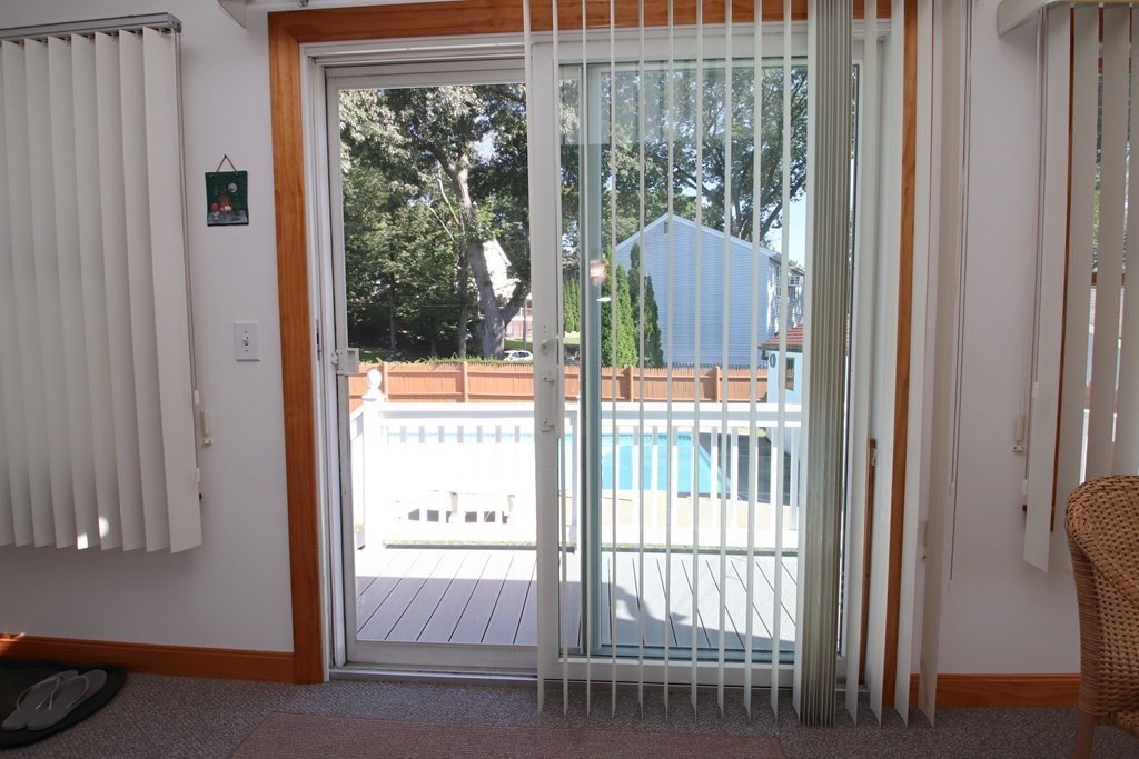 34 Adams Avenue Saugus, MA 01906 - Photo 36 of 42 a view of a balcony with a floor to ceiling window