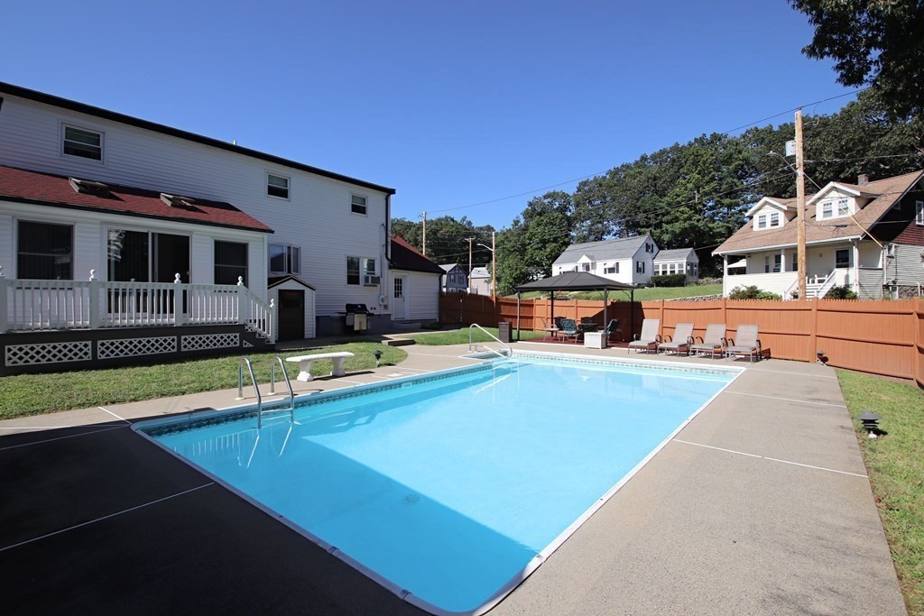 34 Adams Avenue Saugus, MA 01906 - Photo 39 of 42 a view of a house with pool and a yard