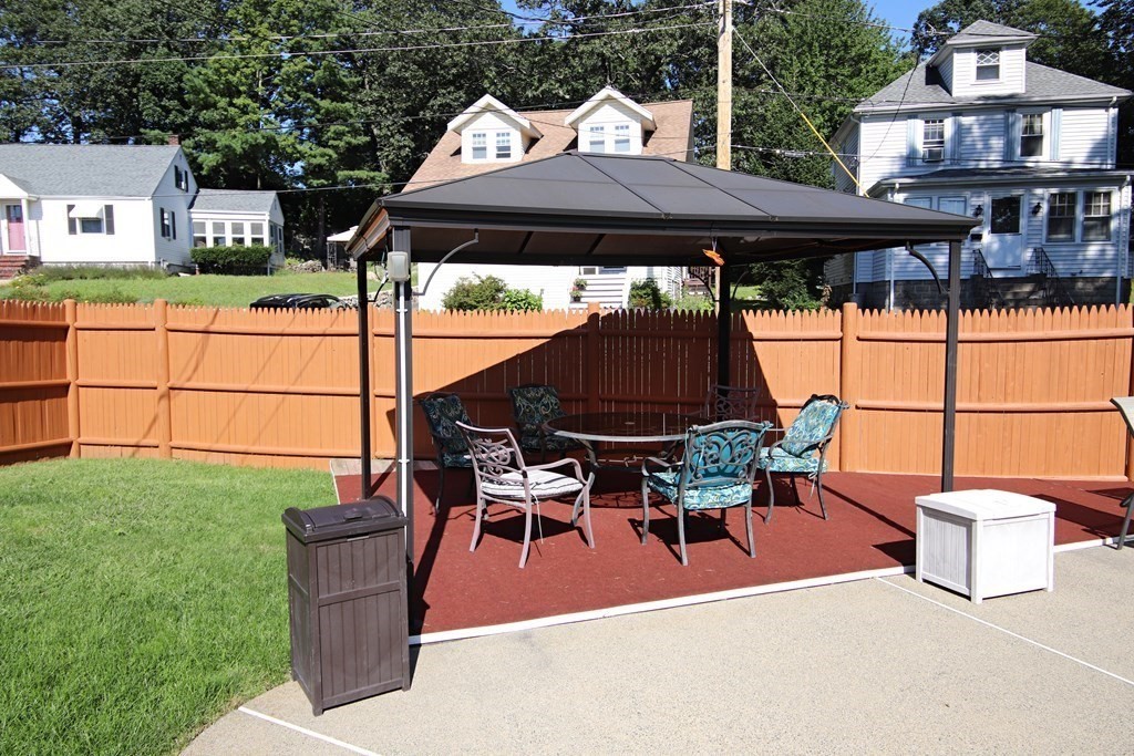 34 Adams Avenue Saugus, MA 01906 - Photo 40 of 42 a patio with table and chairs