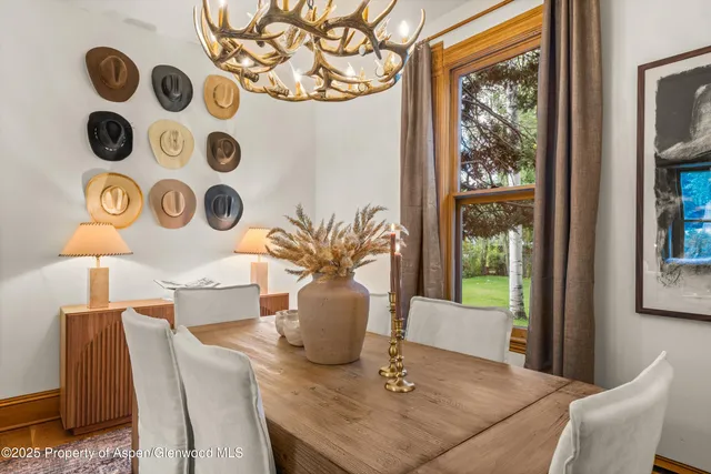 a kitchen with stainless steel appliances granite countertop a sink and a refrigerator