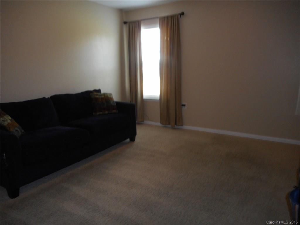 2987 Arthur Road, Unit 173 Indian Land, SC 29707 - Photo 7 of 18 a living room with furniture and a window