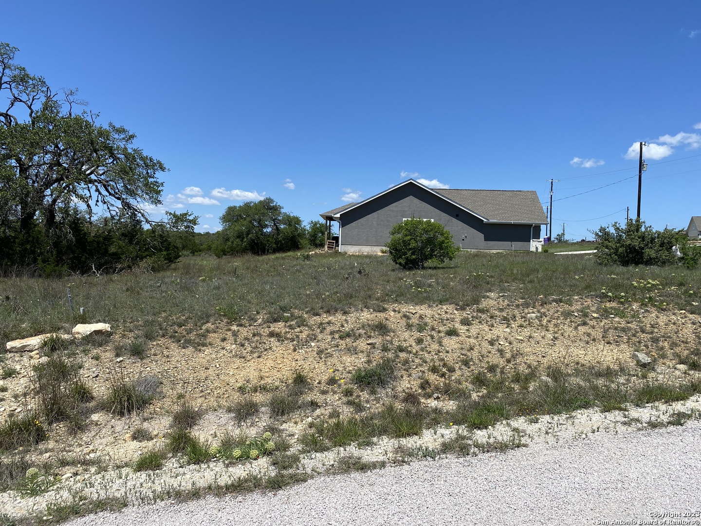 136 George Dolson Blanco, TX 78606 - Photo 3 of 5 a view of a house with a yard