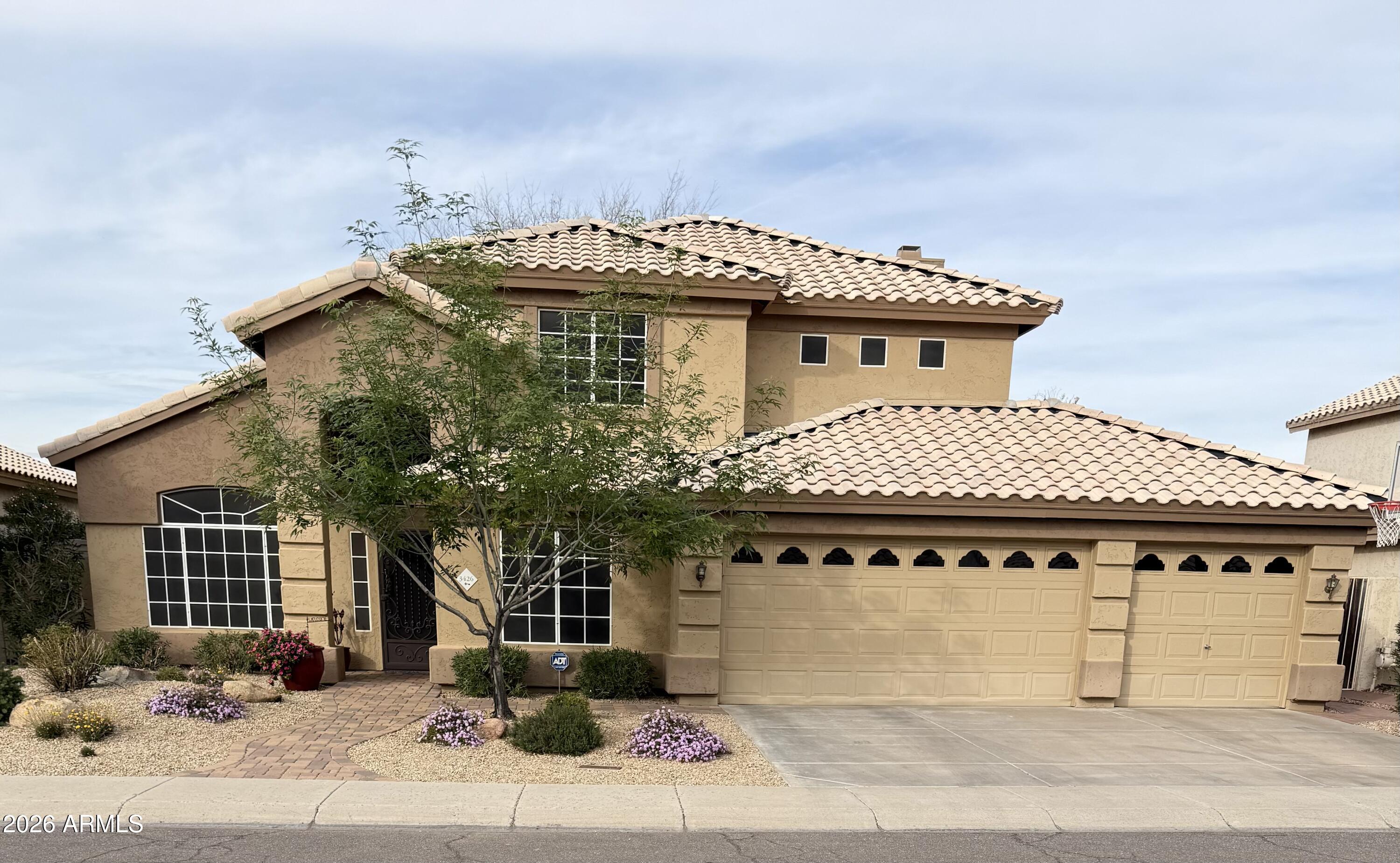 3426 East Clark Road Phoenix, AZ 85050 - Photo 1 of 48 a front view of a house