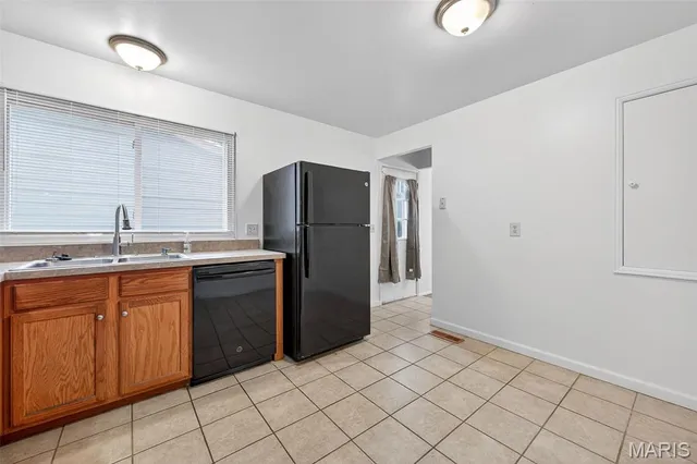 $235,000 | 2560 Woodsage Drive, Florissant, MO 63033