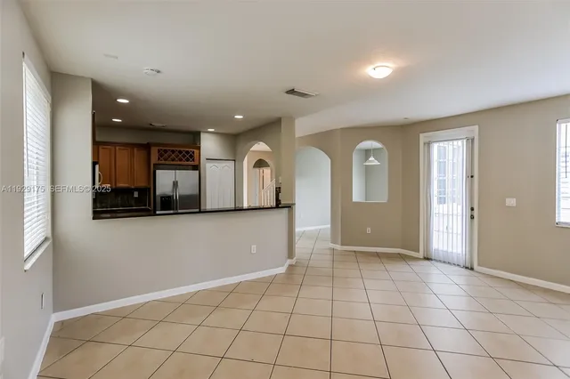 a view of a livingroom with wooden floor