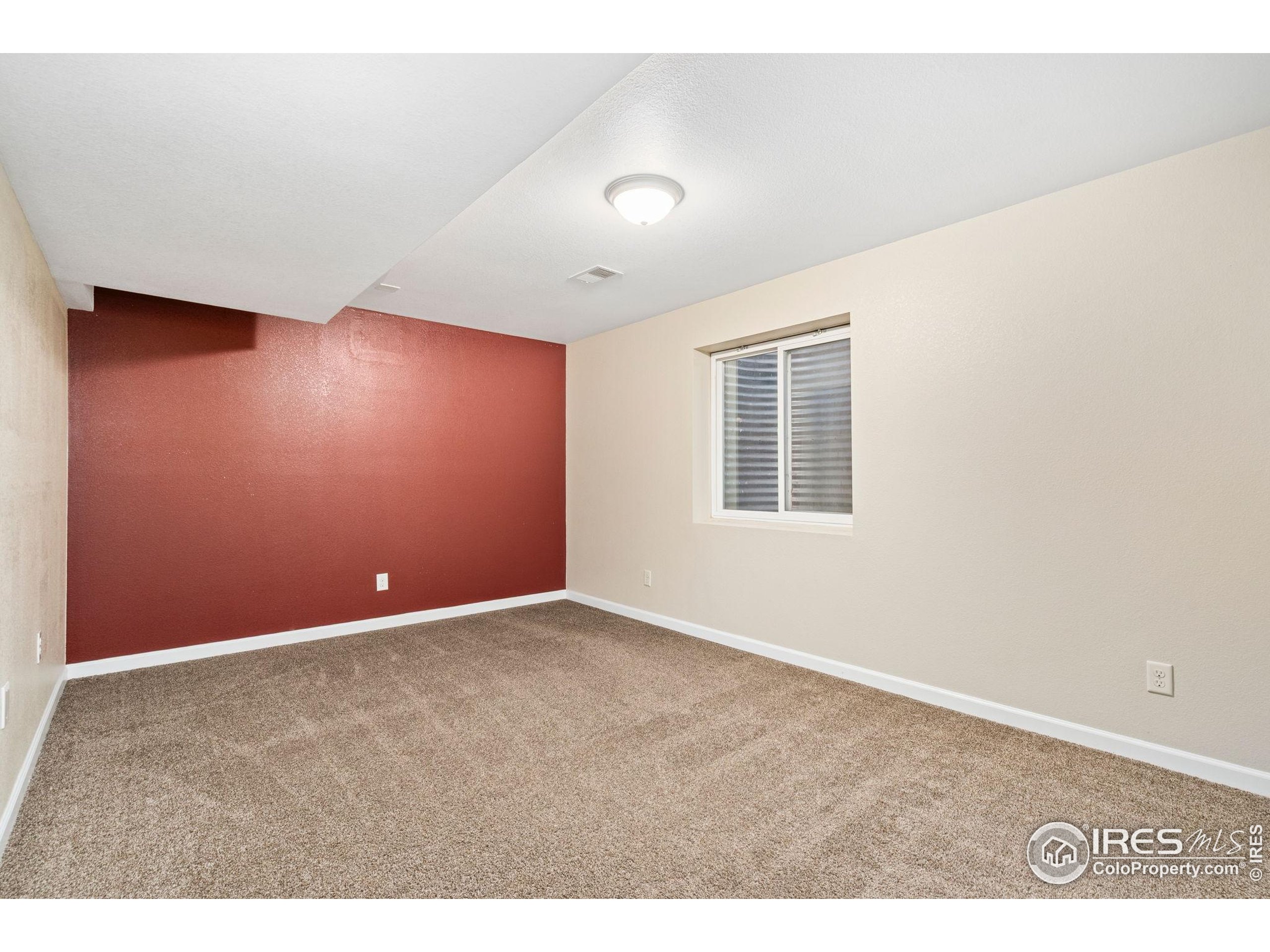 2000 50th Avenue Greeley, CO 80634 - Photo 24 of 34 an empty room with windows