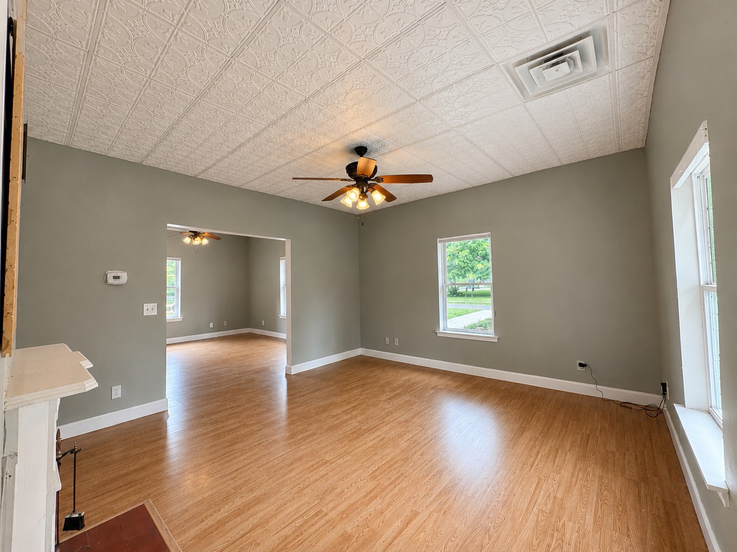 352 Main Street Cerulean, KY 42215 - Photo 16 of 32 wooden floor in an empty room with a window