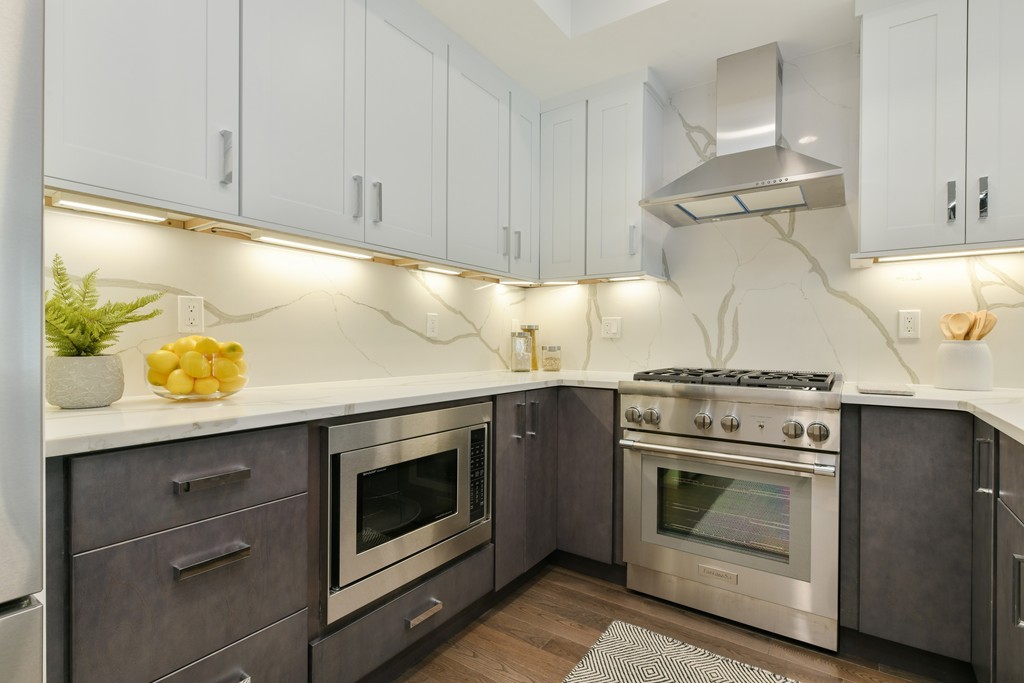 10 Sydney Street, Unit 7 Boston, MA 02125 - Photo 1 of 26 a stove top oven sitting inside of a kitchen
