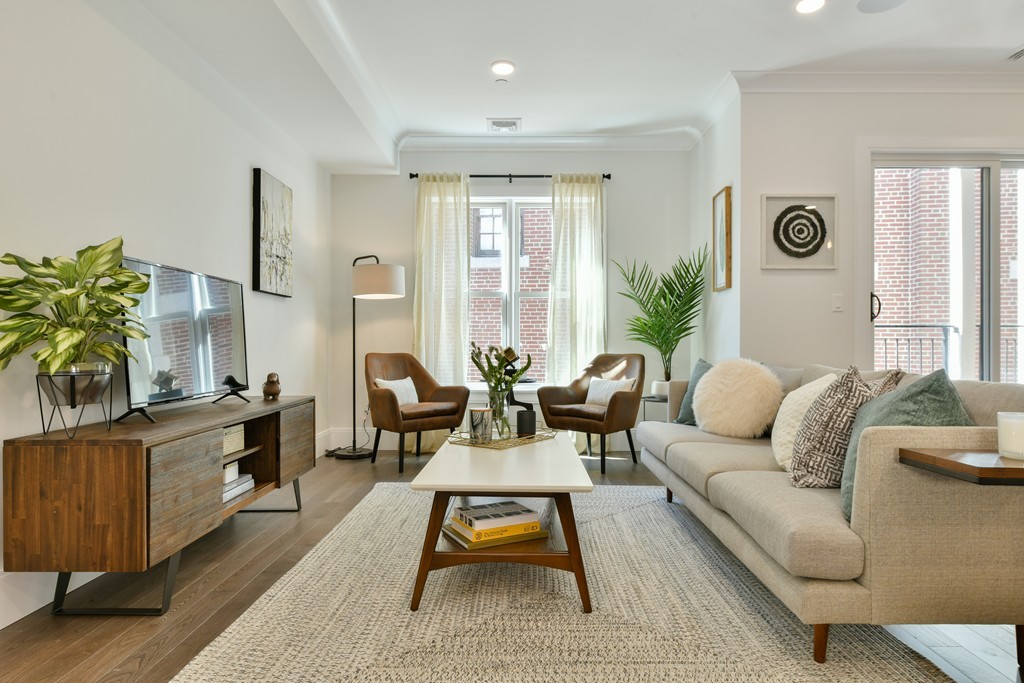 10 Sydney Street, Unit 7 Boston, MA 02125 - Photo 13 of 26 a living room with furniture lamp and window