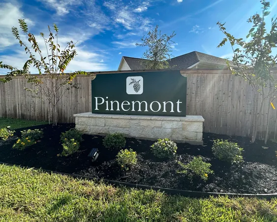 a view of a sign in a yard