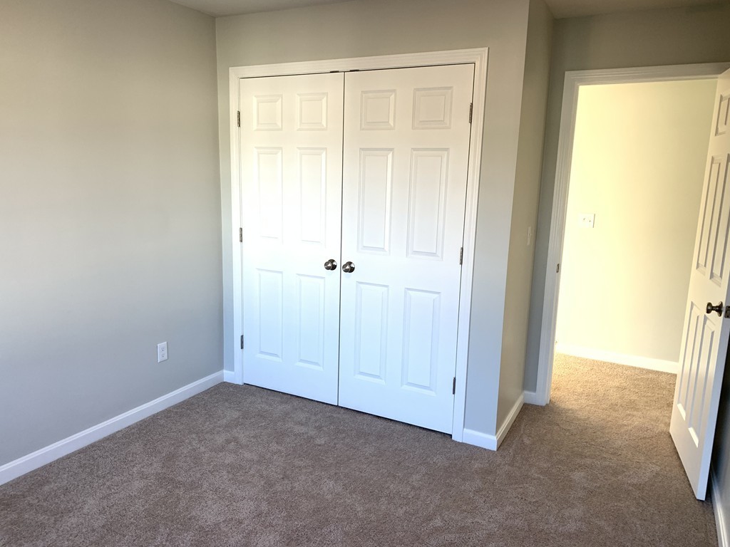 11 Mendon Road, Unit A Attleboro, MA 02703 - Photo 17 of 24 an empty room with windows