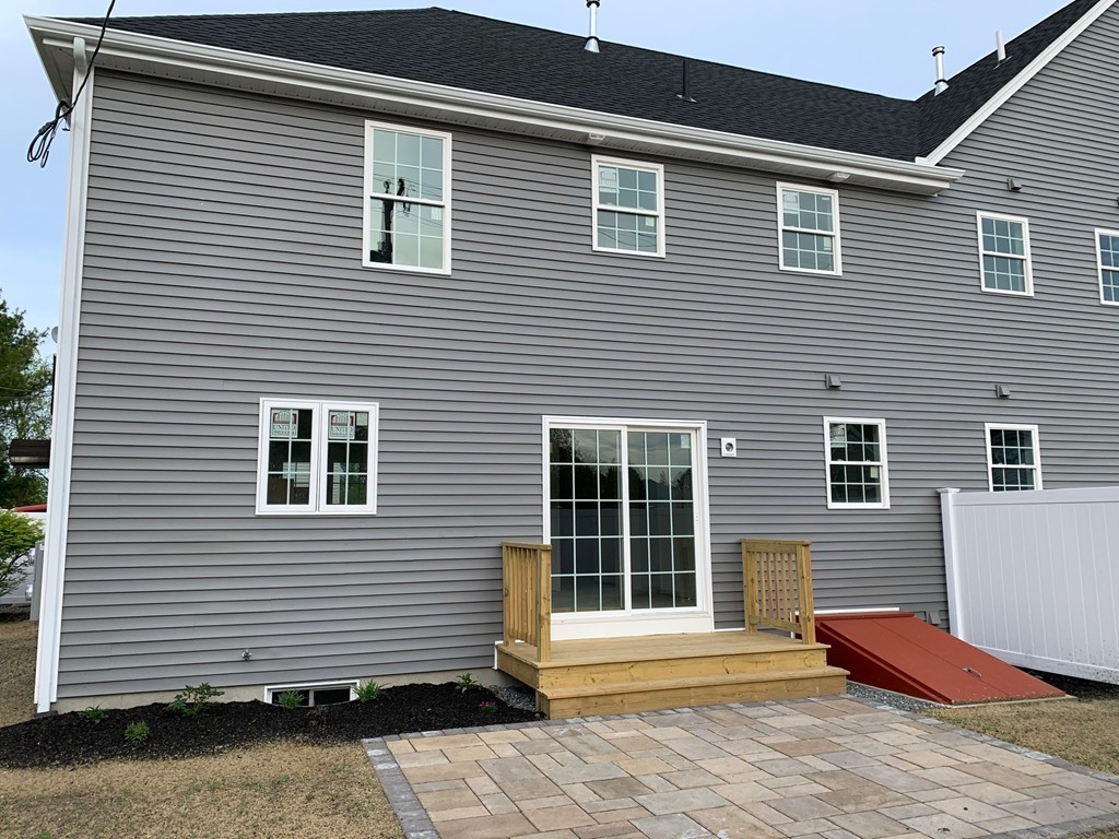 11 Mendon Road, Unit A Attleboro, MA 02703 - Photo 4 of 24 a front view of a house