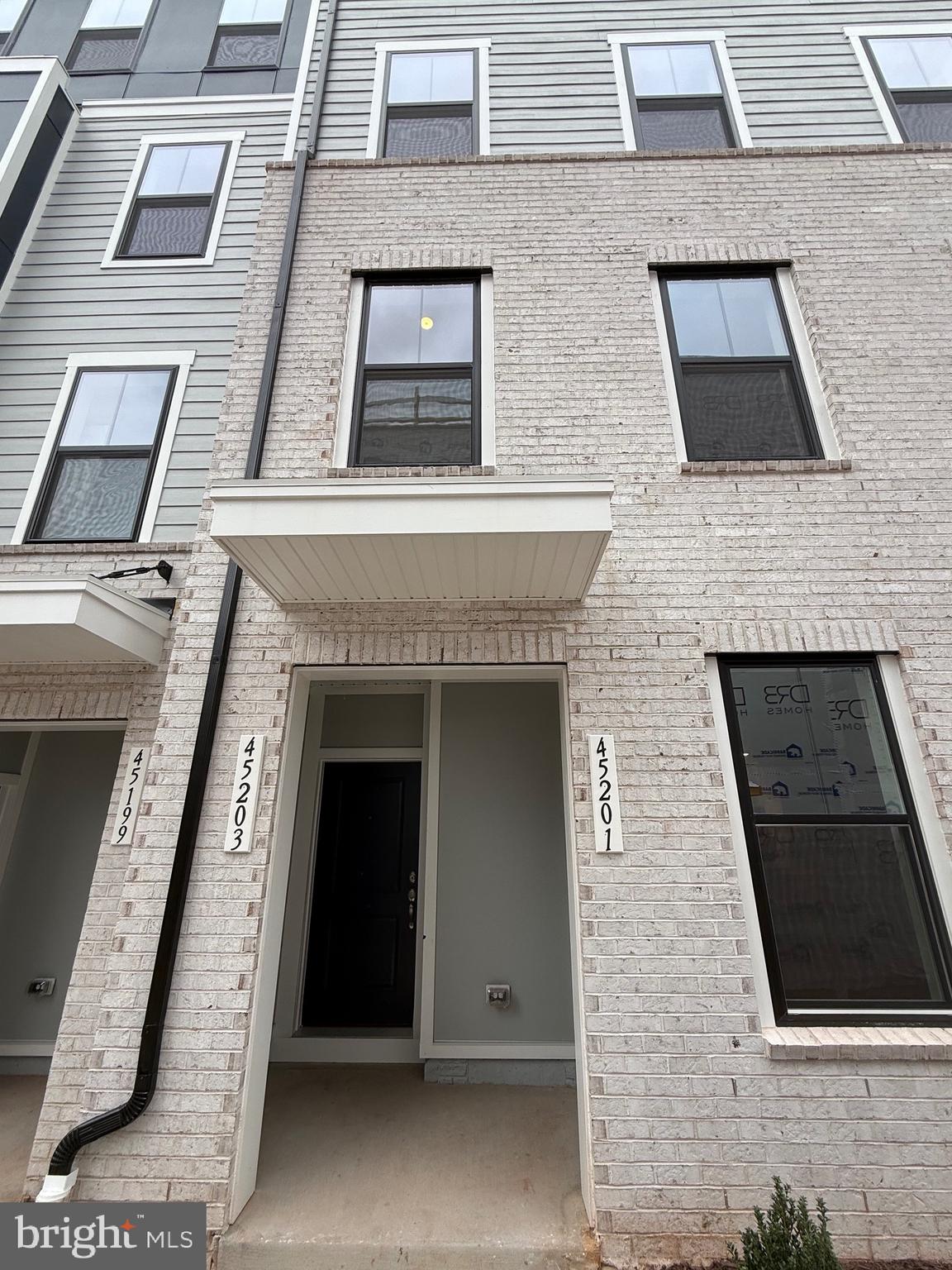 45203 Drowes Terrace Sterling, VA 20166 - Photo 1 of 19 front view of a building