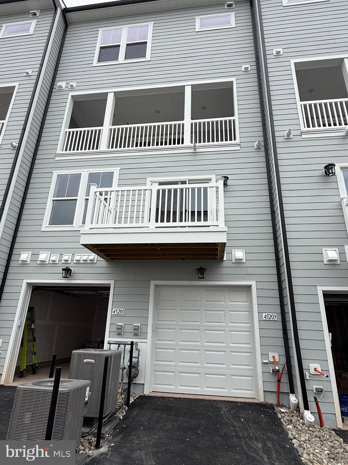 45203 Drowes Terrace Sterling, VA 20166 - Photo 2 of 19 a view of a roof deck
