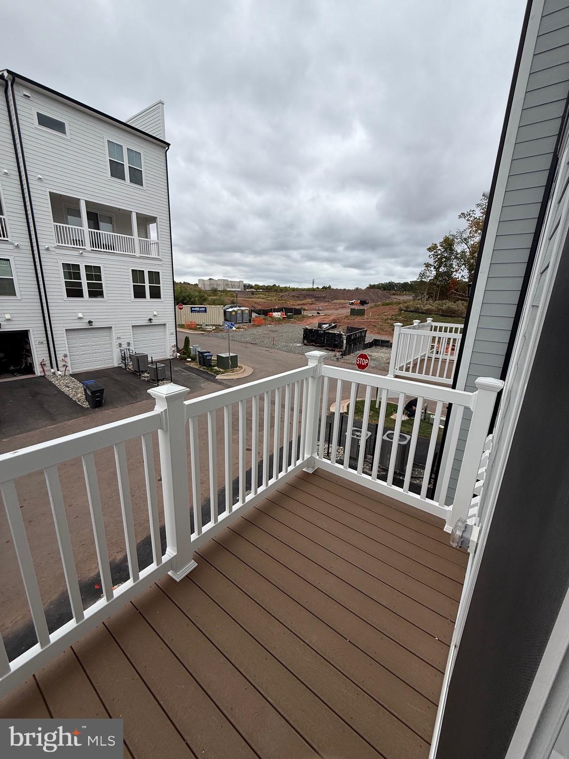 45203 Drowes Terrace Sterling, VA 20166 - Photo 3 of 19 a view of balcony with wooden floor